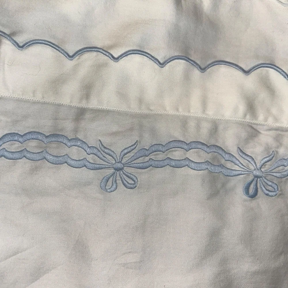 Schweitzer Linens powder blue white embroidered bow ties neck roll pillow cover